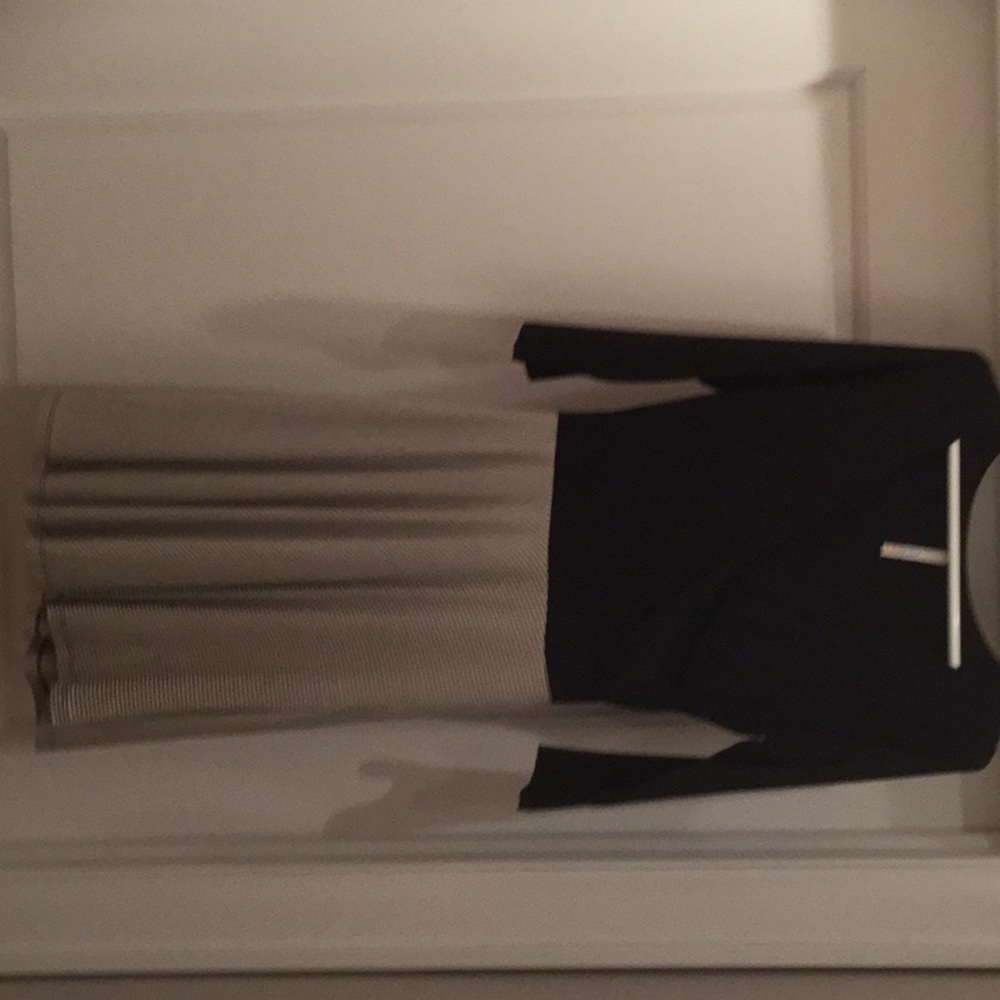 Sexy little black and beige dress.